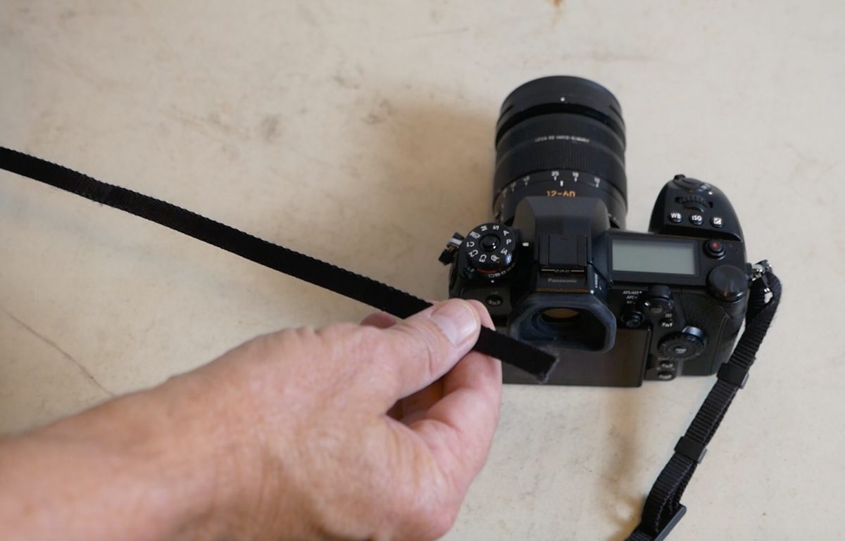 how to attach a camera strap